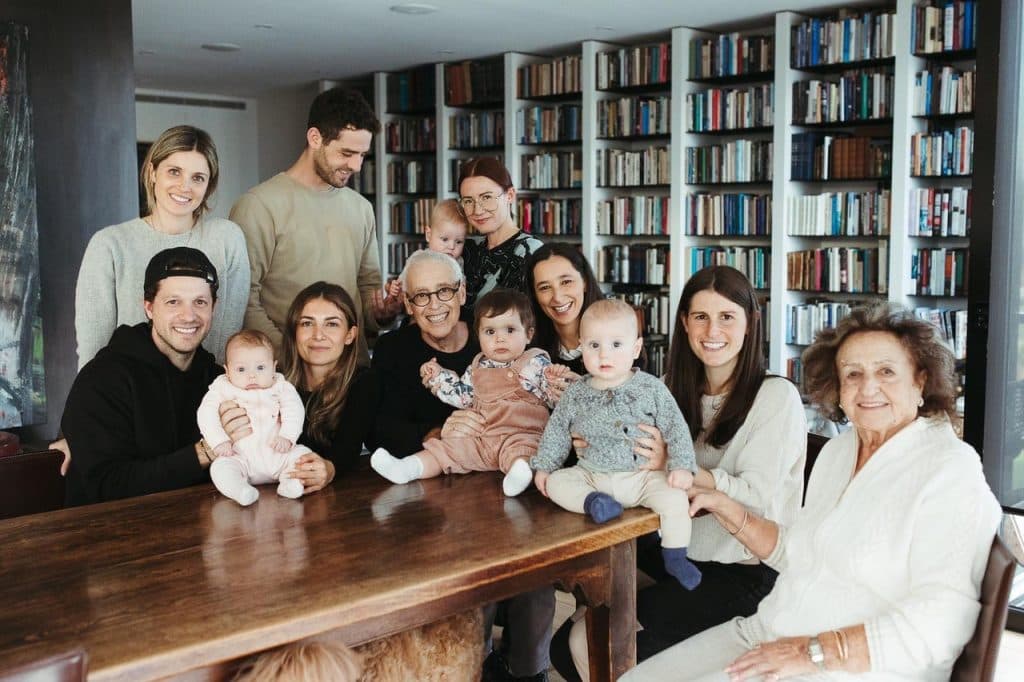 Mark Baker at centre with his wife Michelle Lesh, his children and their partners, grandchildren and mother