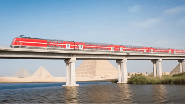 An AI image of a train passing Giza pyramids