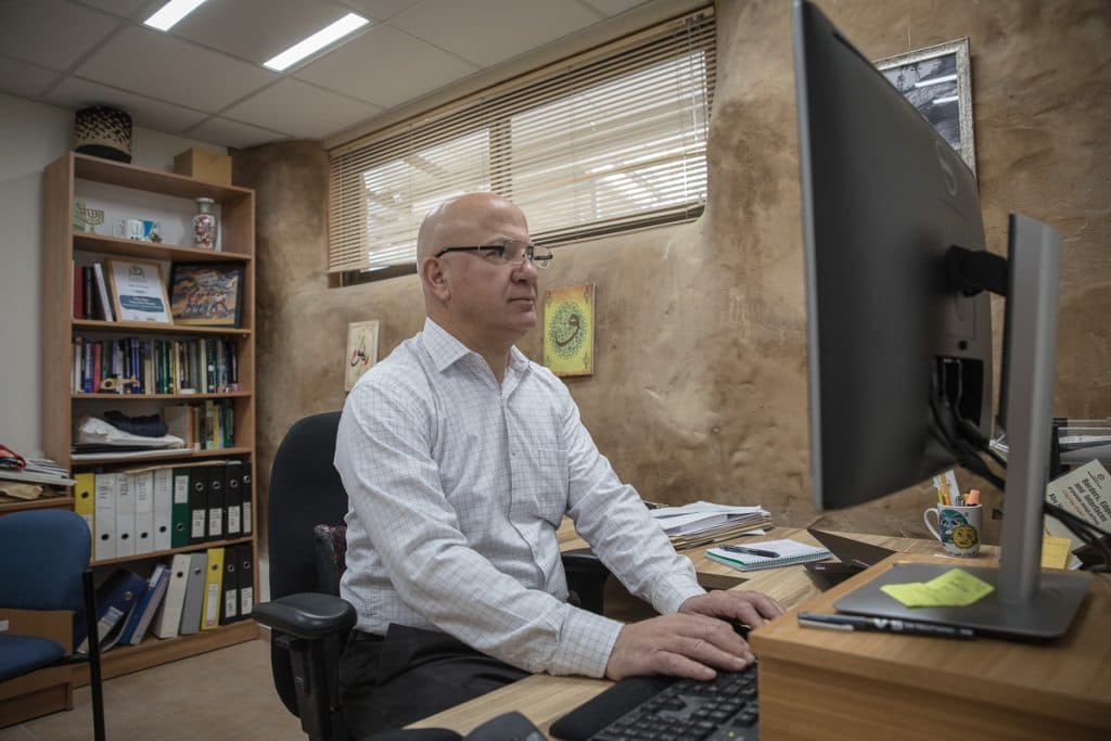 Dr Tareq Abu Hamed, Executive Director of the Arava Institute, in his office at Kibbutz Ketura (Image: Gianluca Cecere).